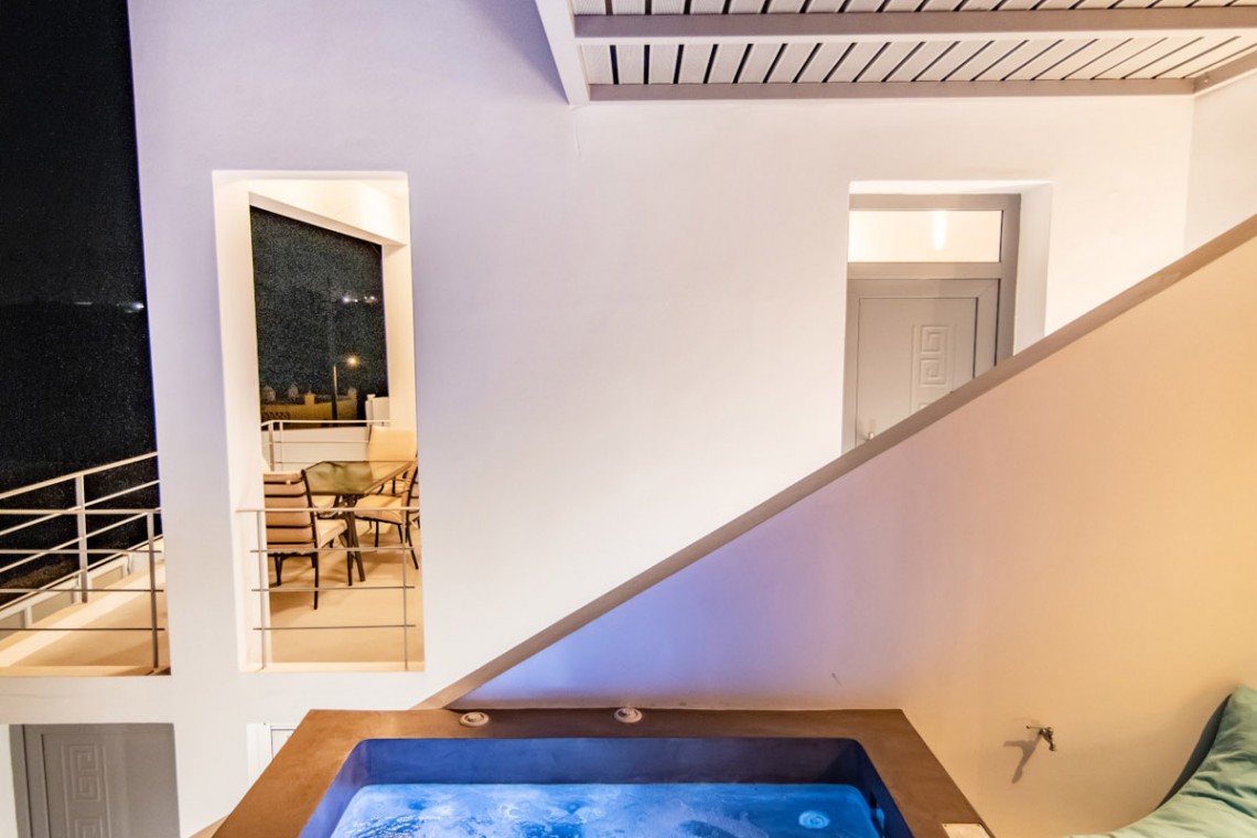 Outdoor jacuzzi with Aegean Sea views on the second terrace of Villa Aegean Colors.