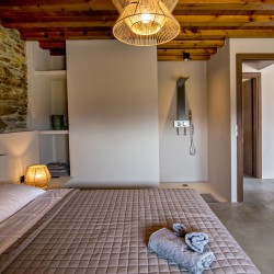Large double bedroom with ensuite walk-in shower at VF Villa in Agios Fokas, Tinos.