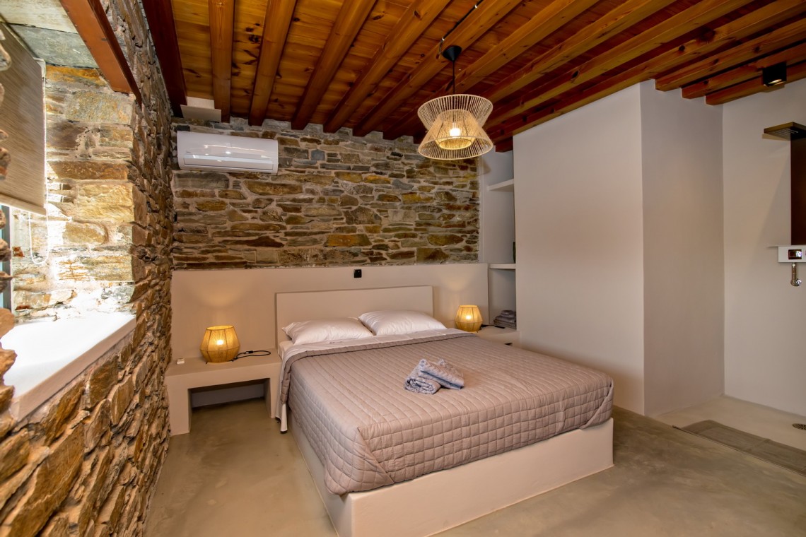 Large double bedroom with ensuite walk-in shower at VF Villa in Agios Fokas, Tinos.