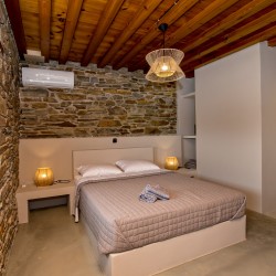 Large double bedroom with ensuite walk-in shower at VF Villa in Agios Fokas, Tinos.