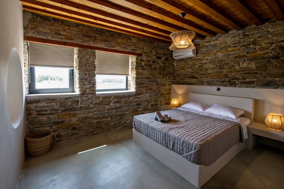 Large double bedroom with ensuite walk-in shower at VF Villa in Agios Fokas, Tinos.
