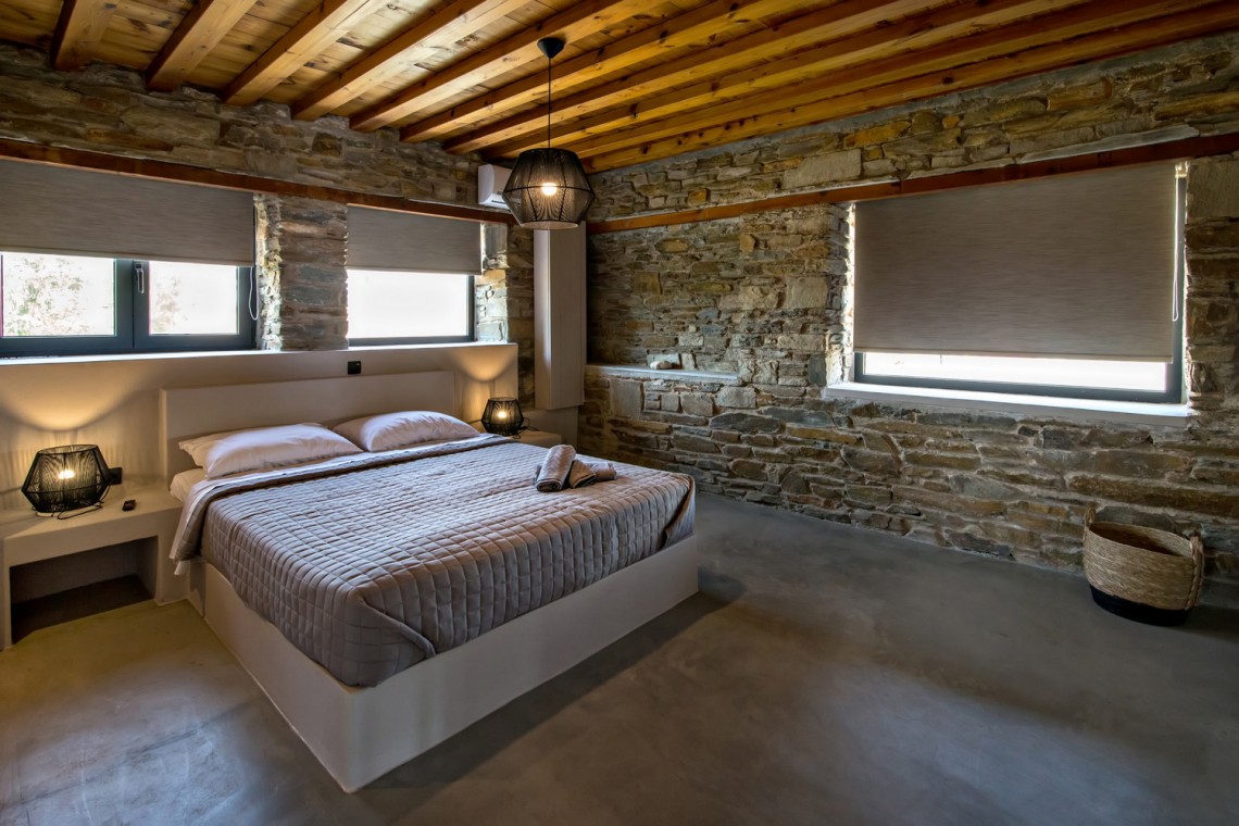 Large double bedroom with ensuite walk-in shower at VF Villa in Agios Fokas, Tinos.
