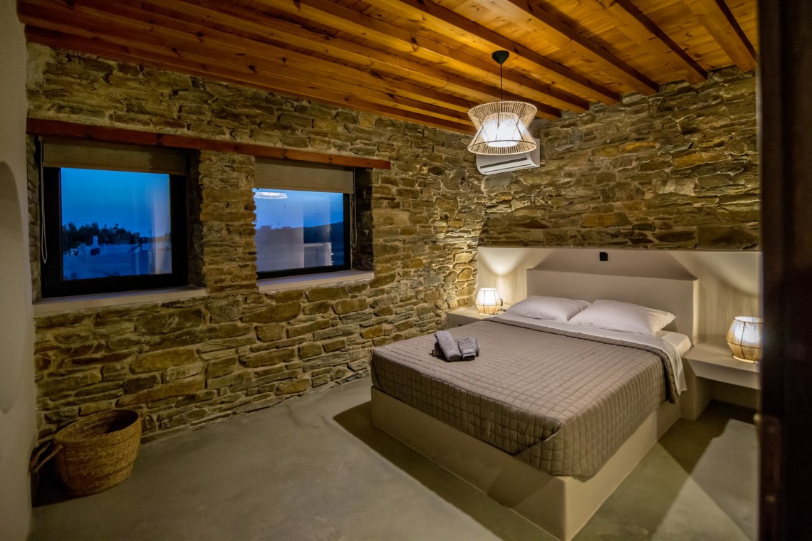 Large double bedroom with ensuite walk-in shower at VF Villa in Agios Fokas, Tinos.