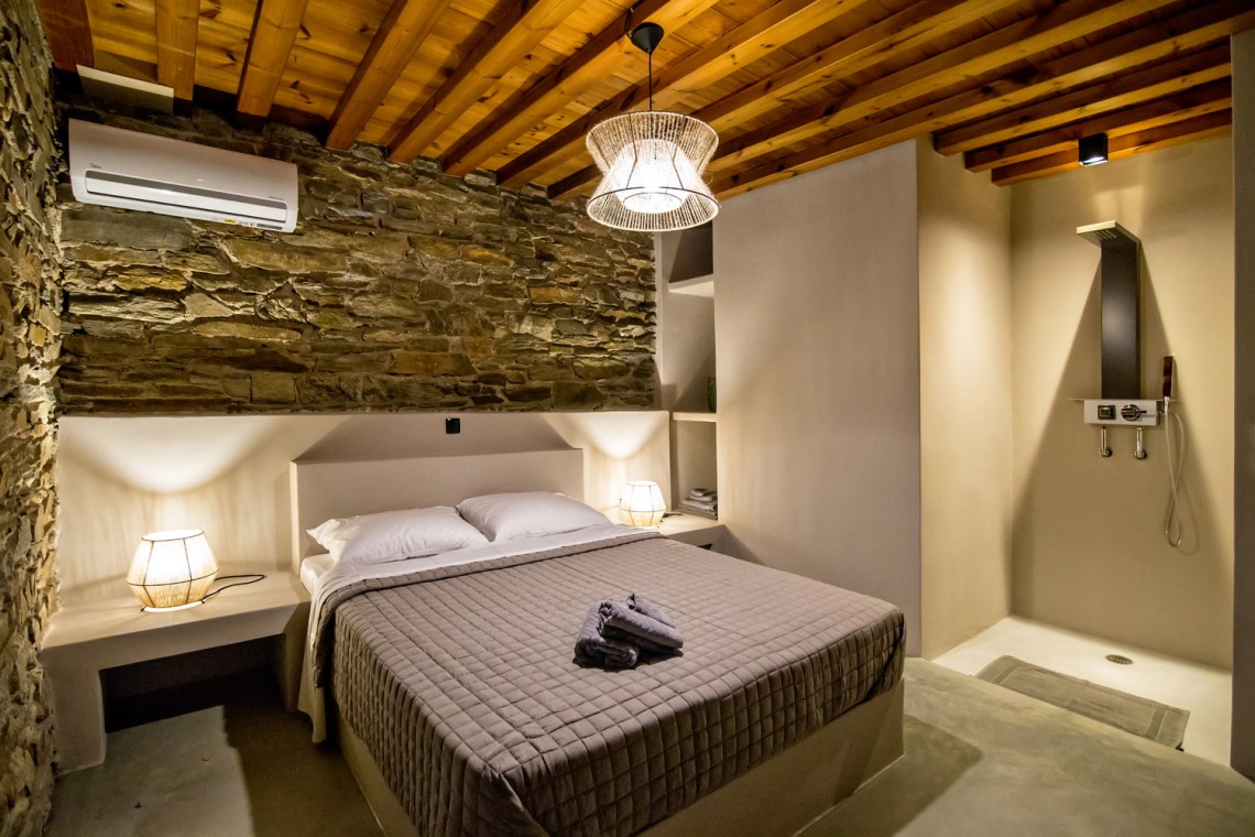 Large double bedroom with ensuite walk-in shower at VF Villa in Agios Fokas, Tinos.