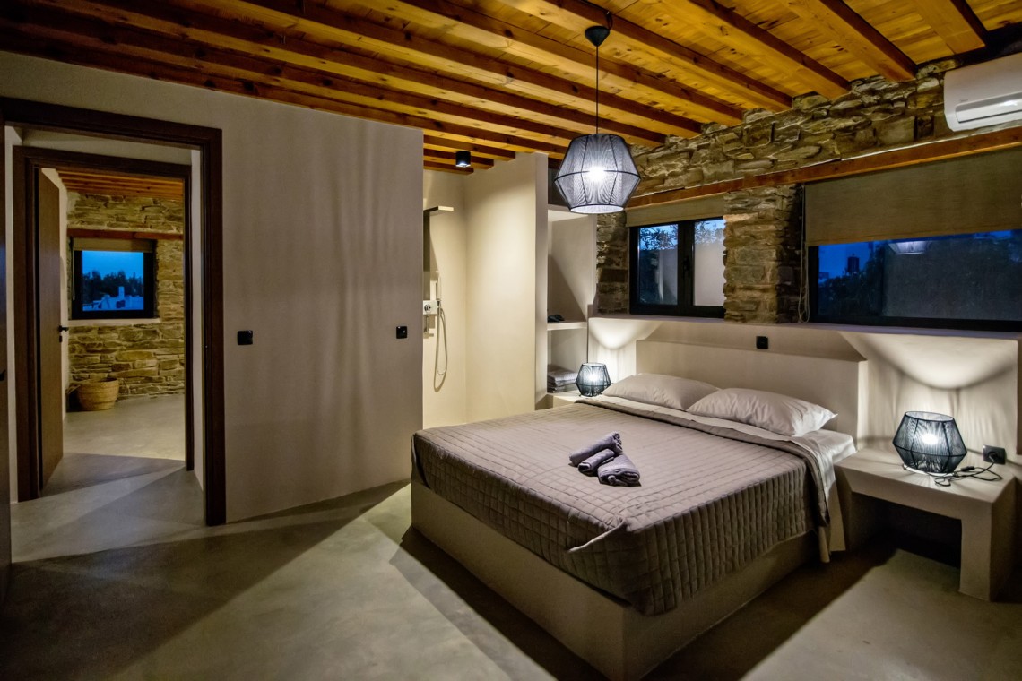 Large double bedroom with ensuite walk-in shower at VF Villa in Agios Fokas, Tinos.