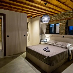 Large double bedroom with ensuite walk-in shower at VF Villa in Agios Fokas, Tinos.