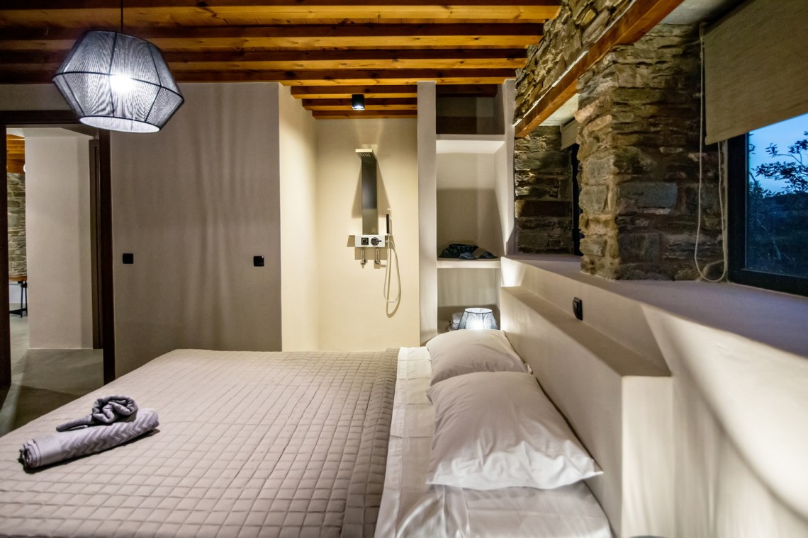 Large double bedroom with ensuite walk-in shower at VF Villa in Agios Fokas, Tinos.