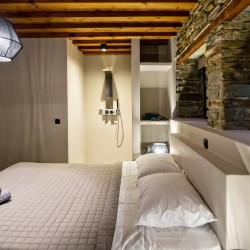 Large double bedroom with ensuite walk-in shower at VF Villa in Agios Fokas, Tinos.