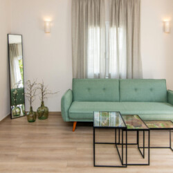 Contemporary and calming living area in Local Living House, offering a stylish and peaceful environment in Tinos Town.