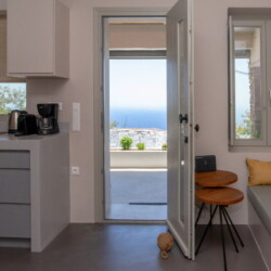View from Ohana Suite’s private terrace overlooking the Aegean Sea in Arnados, Tinos.