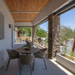 View from Ohana Suite’s private terrace overlooking the Aegean Sea in Arnados, Tinos.