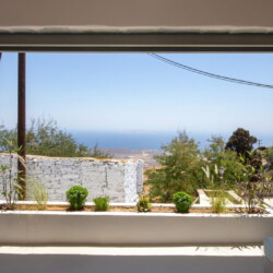 View from Ohana Suite’s private terrace overlooking the Aegean Sea in Arnados, Tinos.